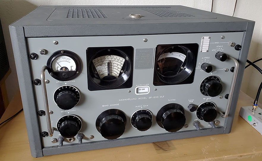 Radio FM/LW. A picture taken in the 1950s- 1960s of a portable transistor  radio. On the front of it a scale with knobs to turn to listen to radio  stations transmitting on